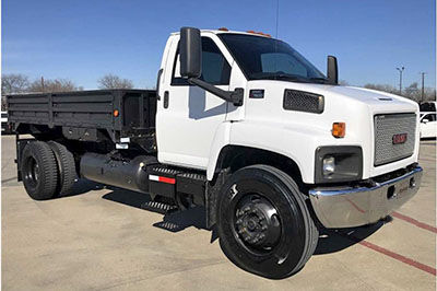 low-emissions stake bed truck